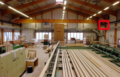 Rails électriques pour l’alimentation d’un pont roulant en milieu ambiant poussiéreux d’une scierie.